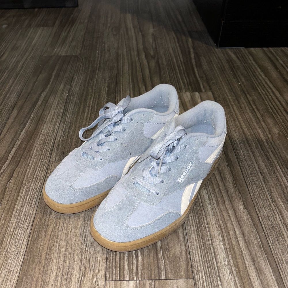 Reebok sneakers size women’s 7.5, light blue, suede fabric. Lightly worn.